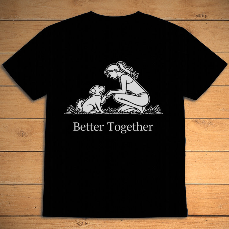 Black dog lover T-shirt showing a girl beside her dog and the words “Better Together”