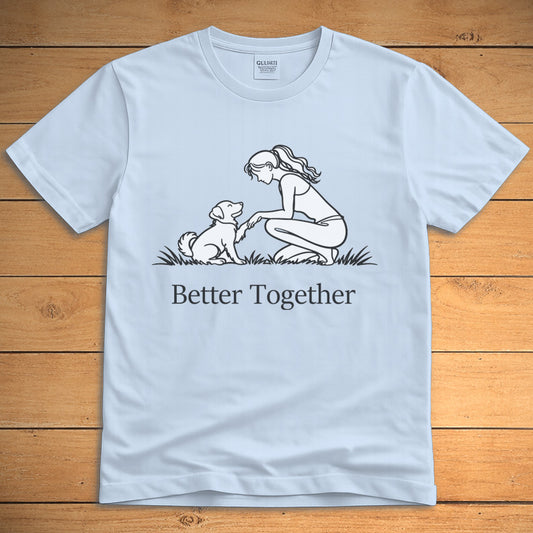 Light blue dog lover T-shirt showing a girl beside her dog and the words “Better Together”
