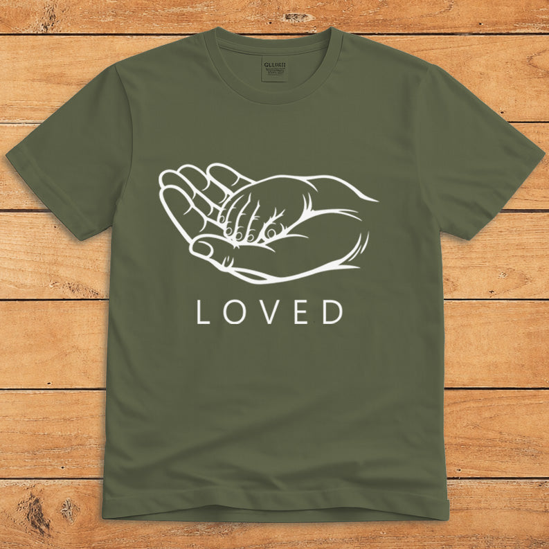 Military green parent T-shirt showing a grown-up holding a child’s hand alongside the word “LOVED”