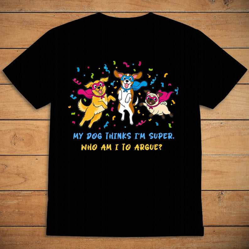 Black funny dog T-shirt featuring cartoon superhero dogs and the words “My Dog Thinks I’m Super”